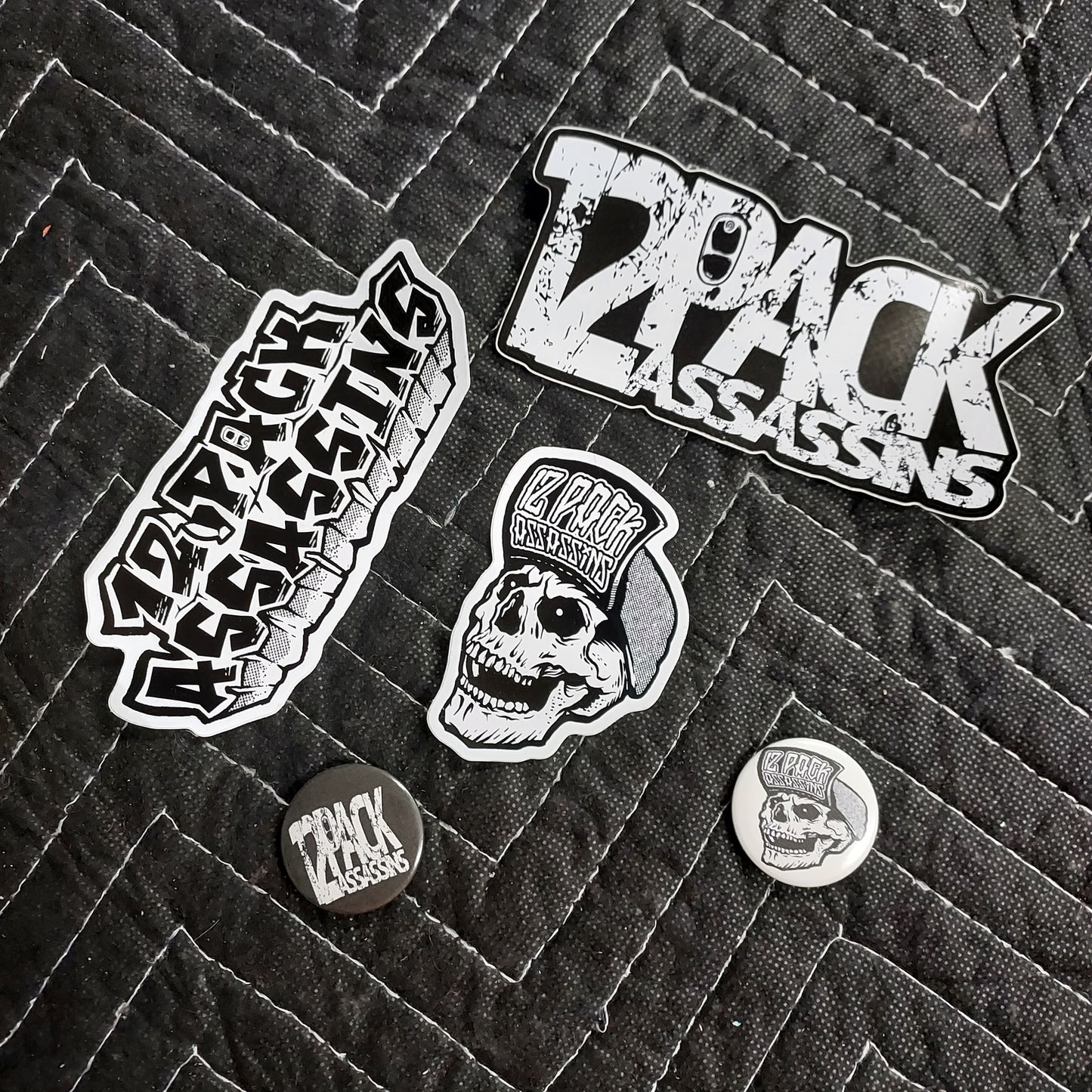 12pack Assassins sticker/pin pack